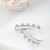 A pair of earrings with diamonds